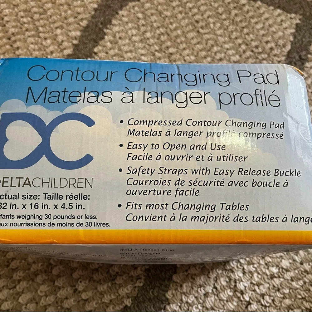 Delta Children Foam Contoured Changing Pad with Waterproof Cover